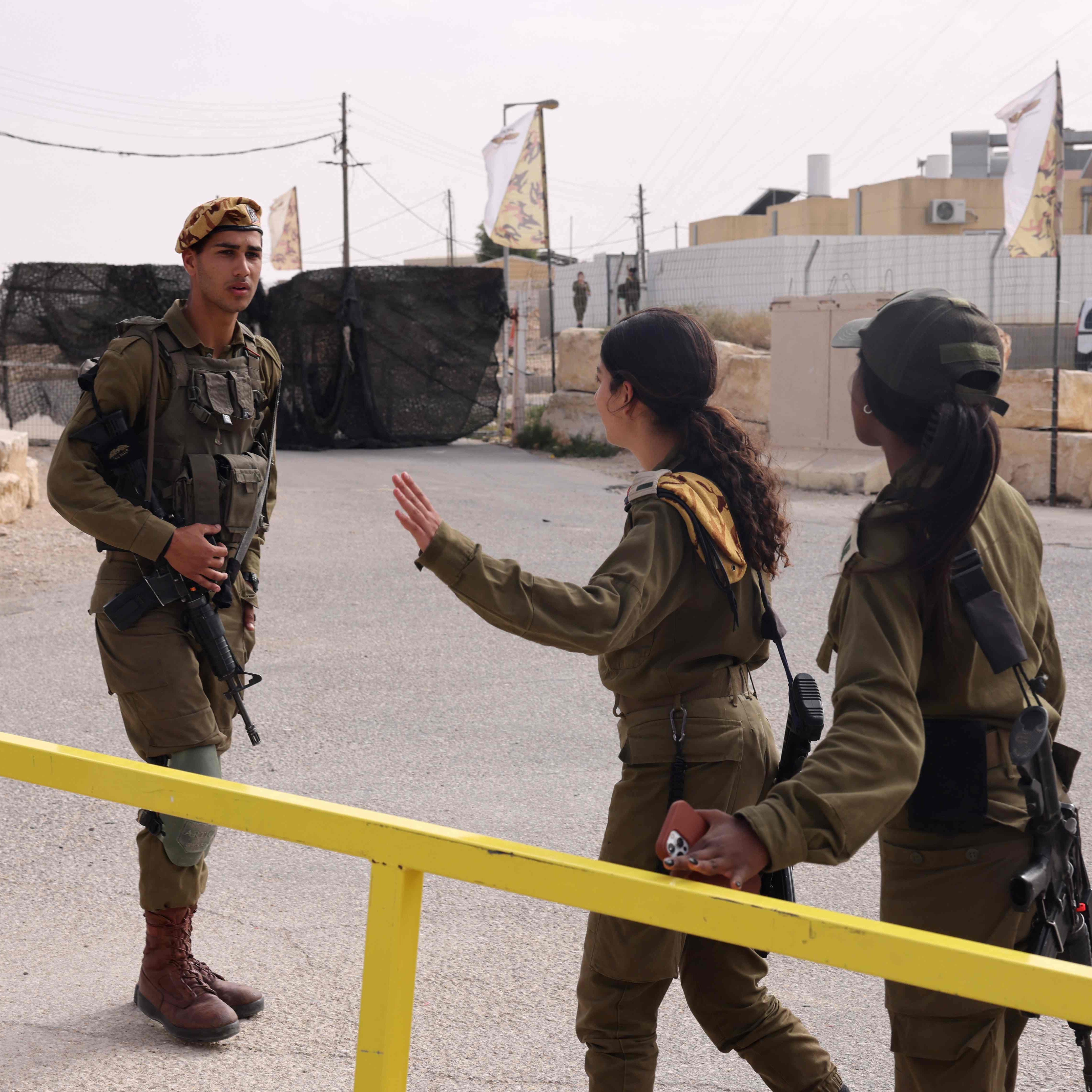 Israeli soldiers are pictured outside the Mount Harif military base near the city of Mitzpe Ramon in Israel's southern Negev desert, adjacent to the border with Egypt, on June 3, 2023. Two Israeli soldiers were killed in a rare shooting on the Egyptian border, triggering a manhunt in which a third soldier and the "assailant" were killed, the army said.