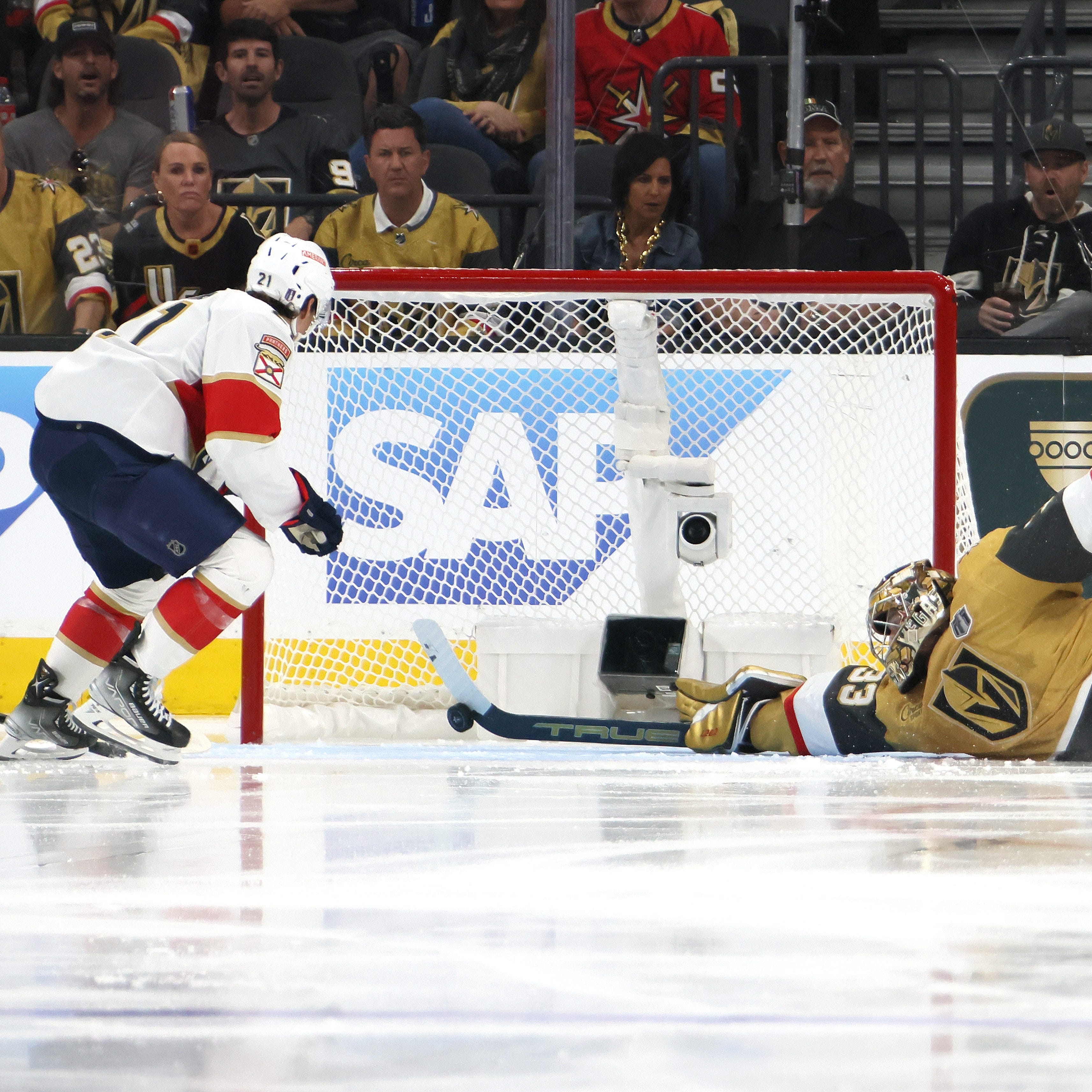 Game 1: Vegas Golden Knights goalie Adin Hill makes a stick save against the Florida Panthers' Nick Cousins.