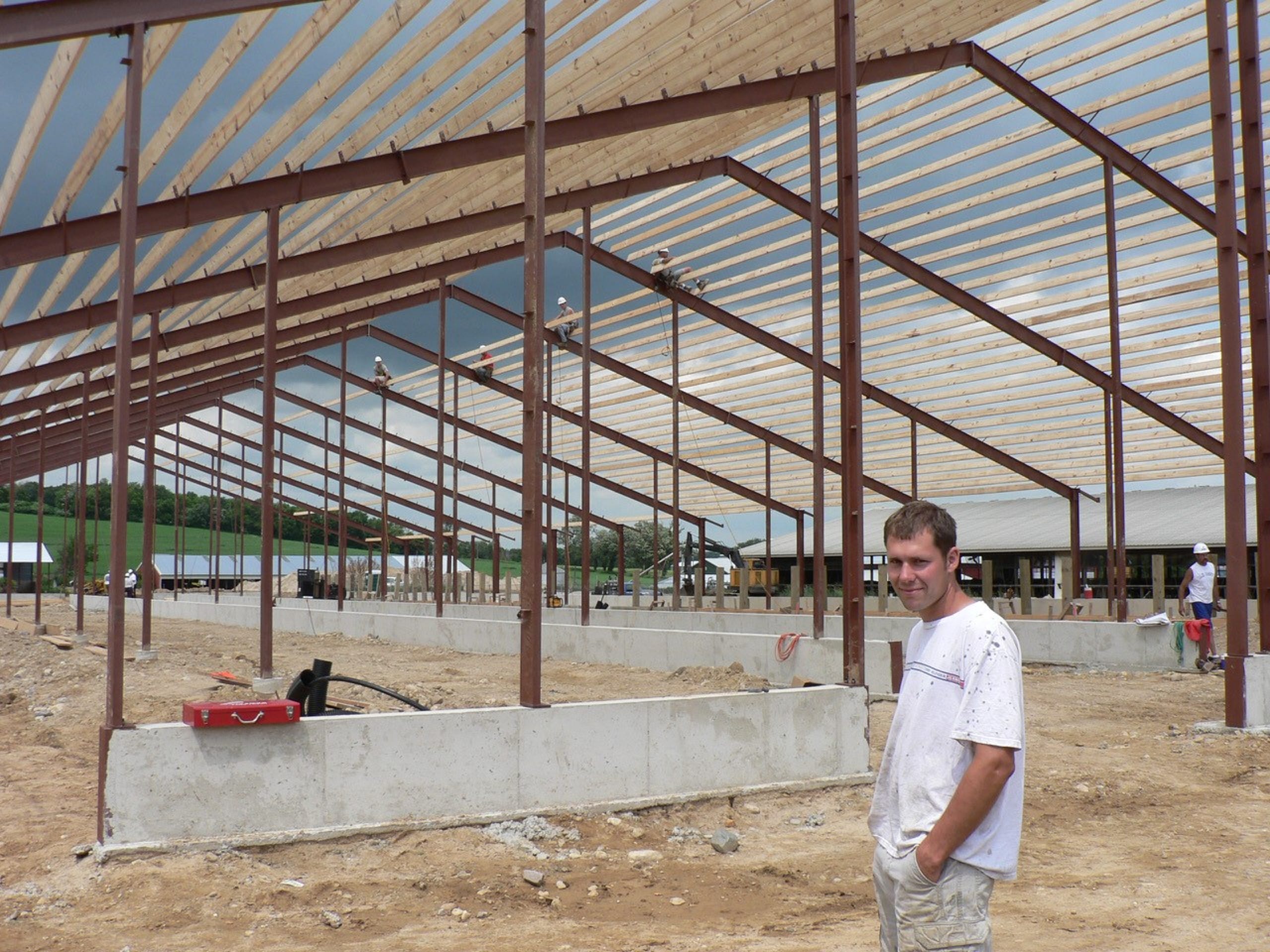 A new barn for more cows for a new generation.