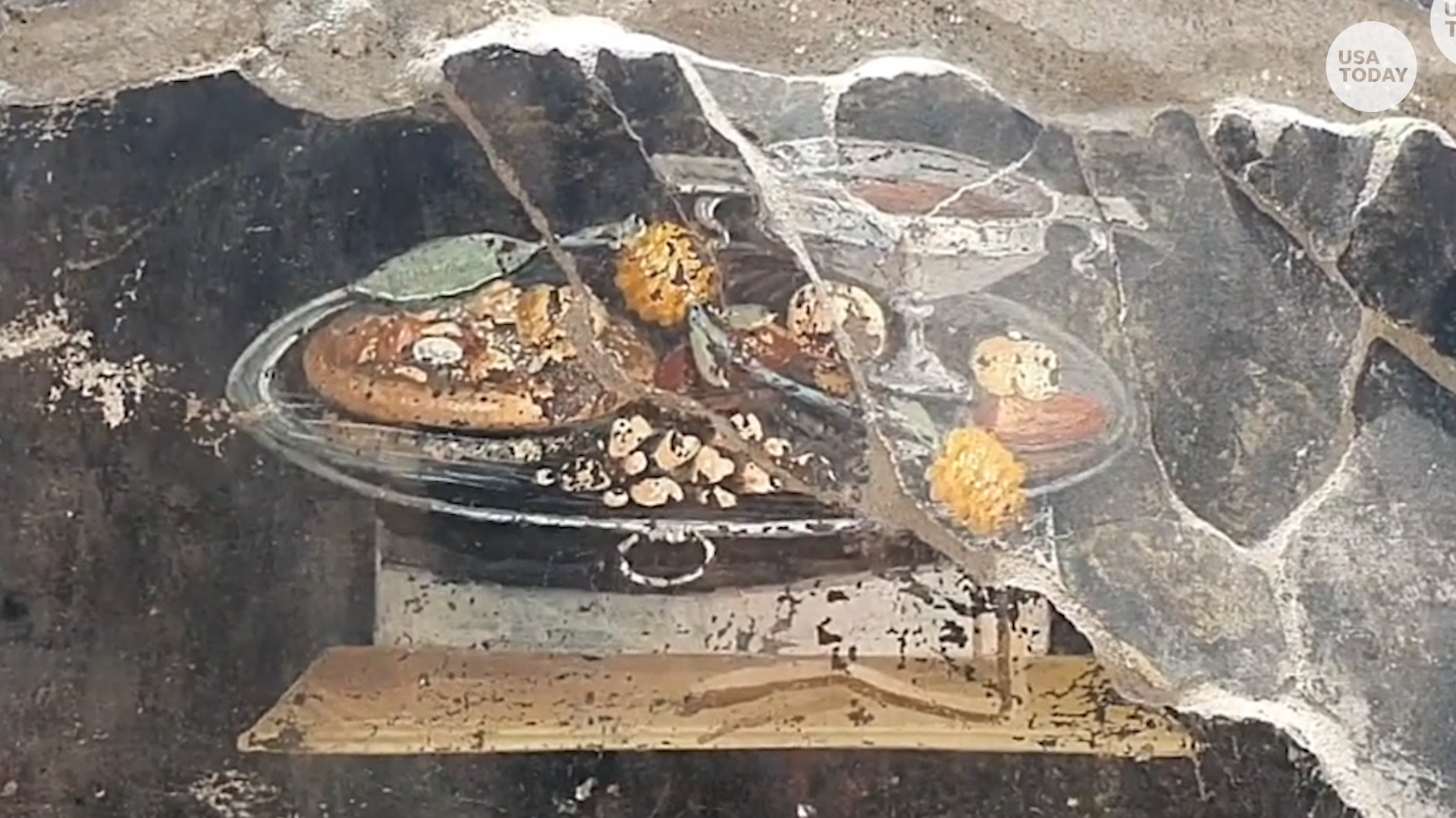 Discovery in Pompeii Unveils Ancient Painting of Fruit-Topped Bread: A Predecessor to Pizza