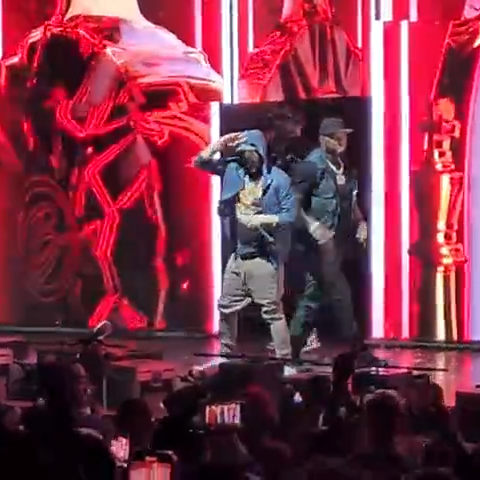 Eminem, 50 Cent Perform 'Crack a Bottle' at Michigan Show: Watch