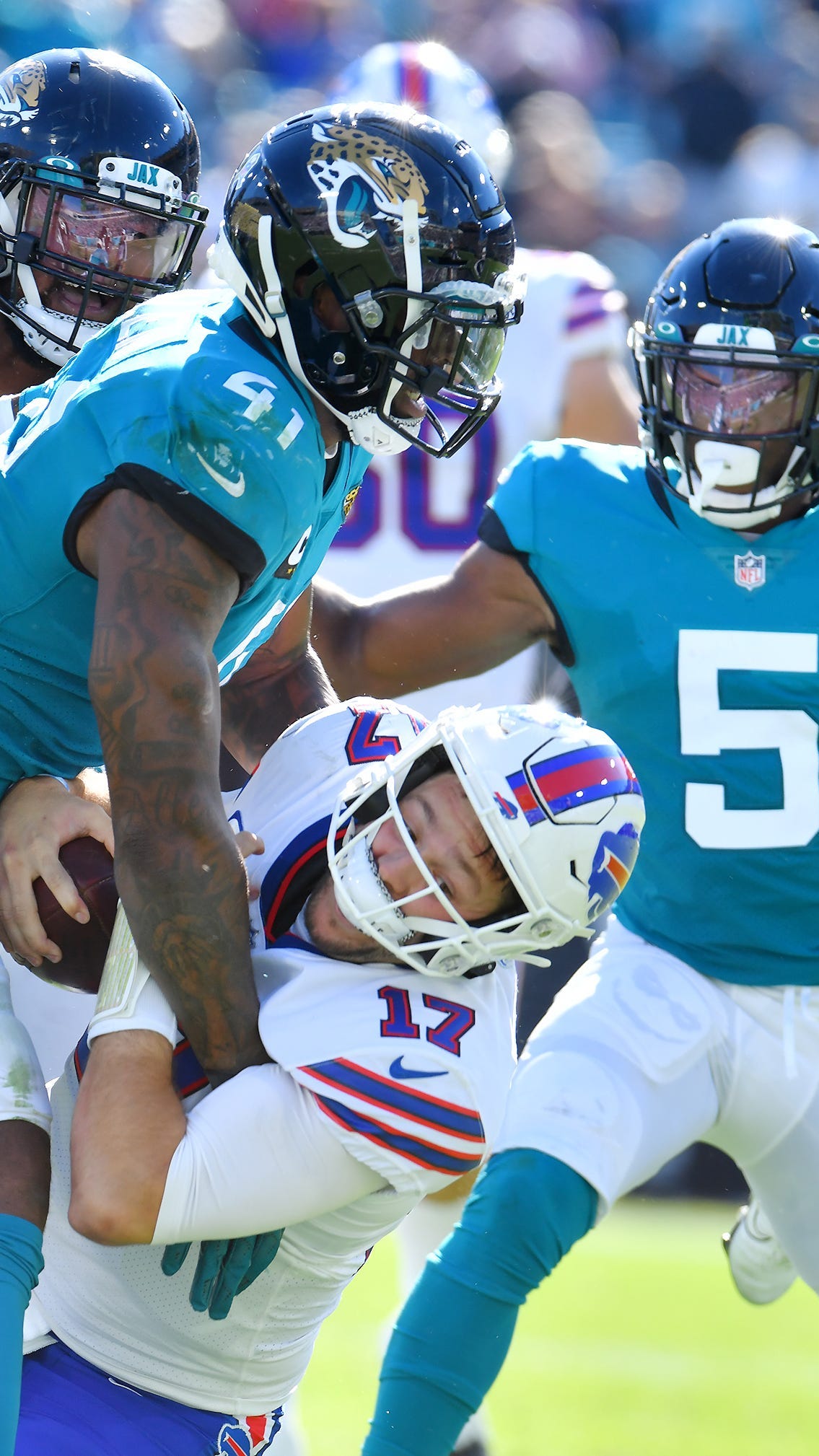 Jacksonville, United States. 29th Nov, 2020. Bears Running Back Kareem Hunt  (27) leaps over a Jaguars defender for yardage in the third quarter as the  Cleveland Browns compete against the Jaguars at