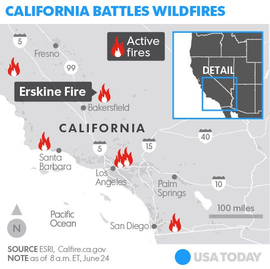 Fast-moving wildfire near Los Angeles destroys 50 homes