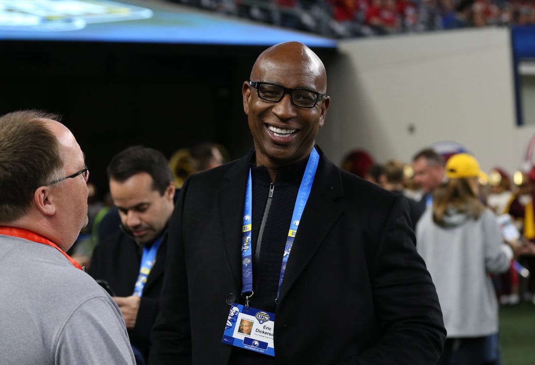 Pro Football Hall of Famer Eric Dickerson on the sidelines prior to the game involving Ohio State against USC in December.