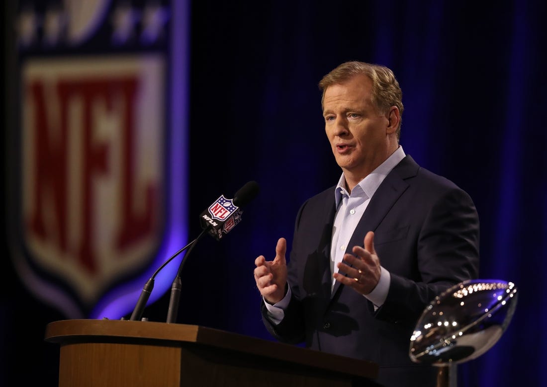 NFL commissioner Roger Goodell, shown addressing the media in advance of Super Bowl LII, on Wednesday announced the league's new national anthem policy.